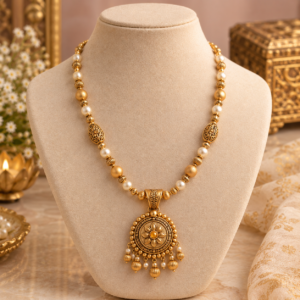 Ornate gold filigree pendant necklace